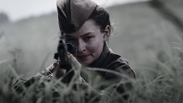 Yuliya Peresild as Lyudmila, about to snipe a German soldier in Battle for Sevastopol