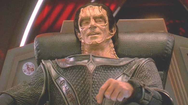 Gul Dukat (Marc Alaimo) sits smugly in a chair in Star Trek: Deep Space Nine