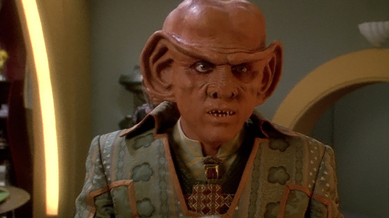 Quark (Armin Shimerman) stands bewildered in Star Trek: Deep Space Nine