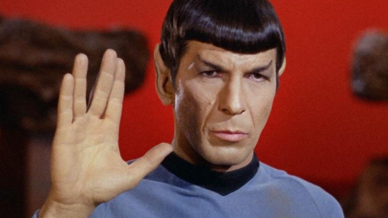 Spock (Leonard Nimoy) gives the Vulcan salute in Star Trek: Strange New Worlds