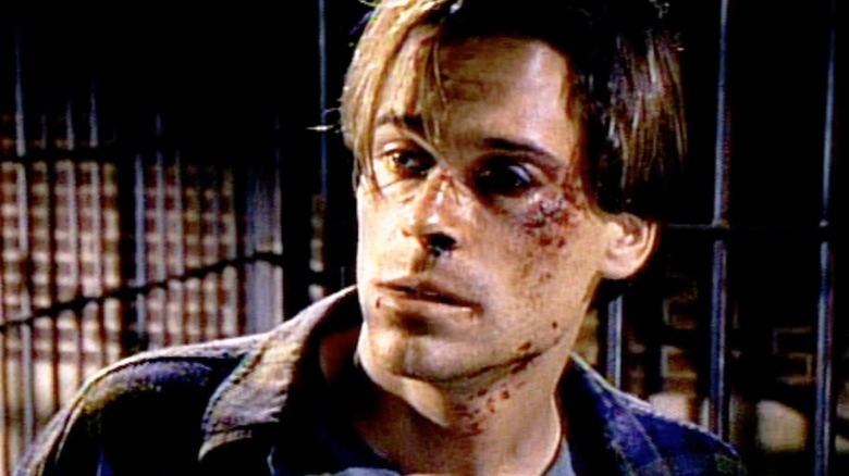 Nick Andros, played by Rob Lowe in the 1994 miniseries The Stand, is beaten and bruised within a prison cell