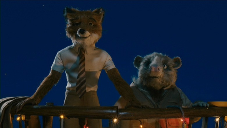 Mr. Fox (George Clooney) standing with Kylie the opossum (Wally Wolodarsky) in Fantastic Mr. Fox