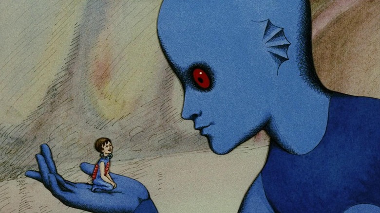 Tiwa (Jennifer Drake) holding up young Terr (Eric Baugin) in Fantastic Planet