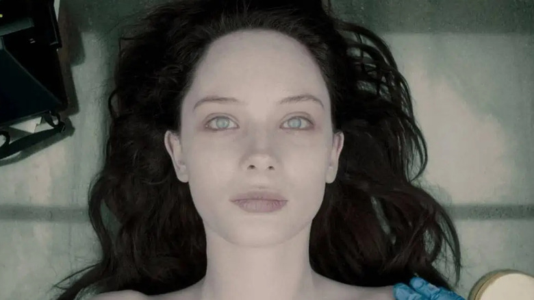 Olwen Kelly as Jane Doe, dead on a table in The Autopsy of Jane Doe