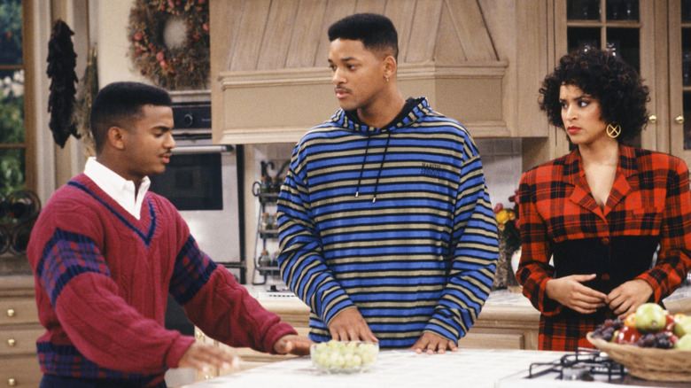 Alfonso Ribiero as Carlton Banks talks to Will Smith as Will Smith and Karyn PArsons as Hilary Banks in the kitchen in Fresh Prince of Bel-Air