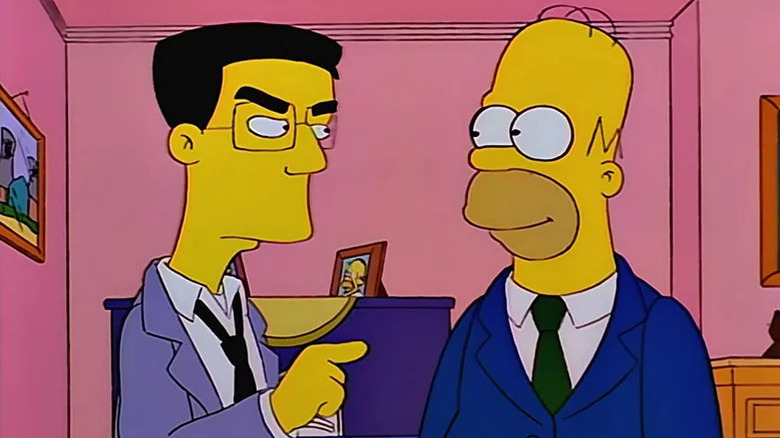 Homer Simpson smiles at his boss on The Simpsons.