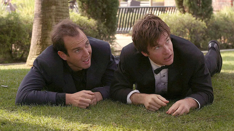 GOB and Michael Bluth laying on their stomachs in the grass in Arrested Development