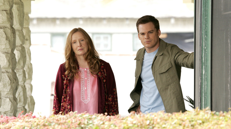 David and Ruth Fisher standing near a building on Six Feet Under