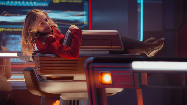 Captain Ake sitting very strangely in a bridge chair in Star Trek: Starfleet Academy