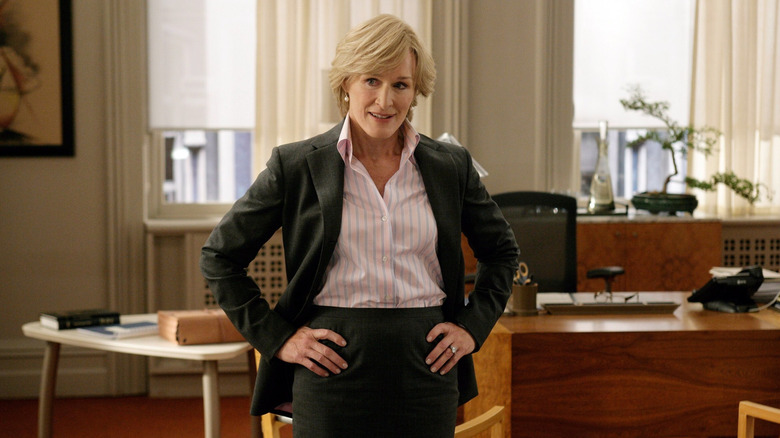 Glenn Close as Patty Hewes, standing in her office on Damages