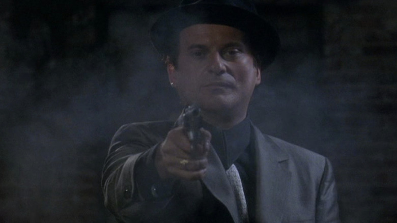 Tommy (Joe Pesci) shoots a gun in Goodfellas