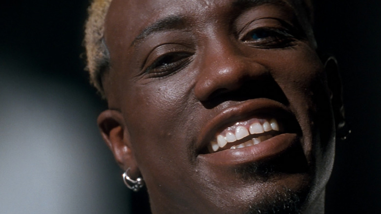 Wesley Snipes as Simon, keeping an eye on you in Demolition Man