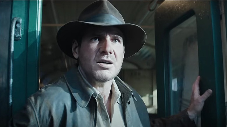 Young Indiana Jones escapes a train car