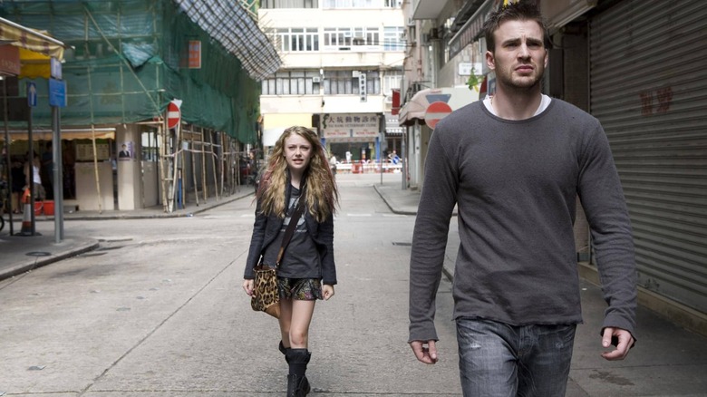 Nick and Cassie walking through Hong Kong streets in Push