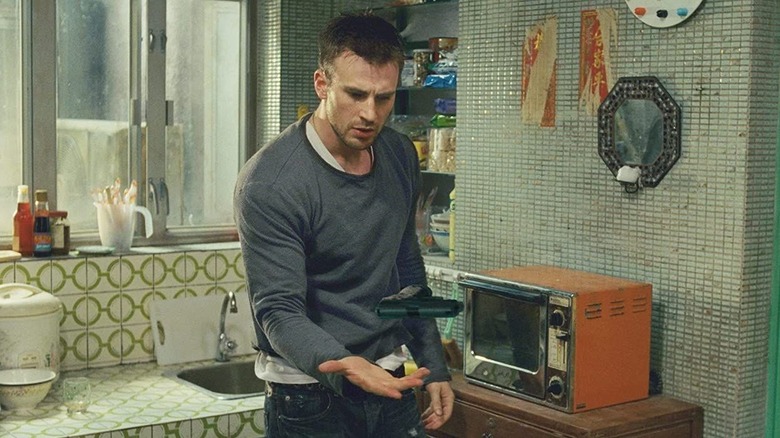 Nick levitates a gun with his mind in Push