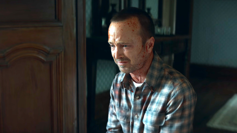 Black Mirror, Cliff looking in horror at the remains of his recently-murdered family