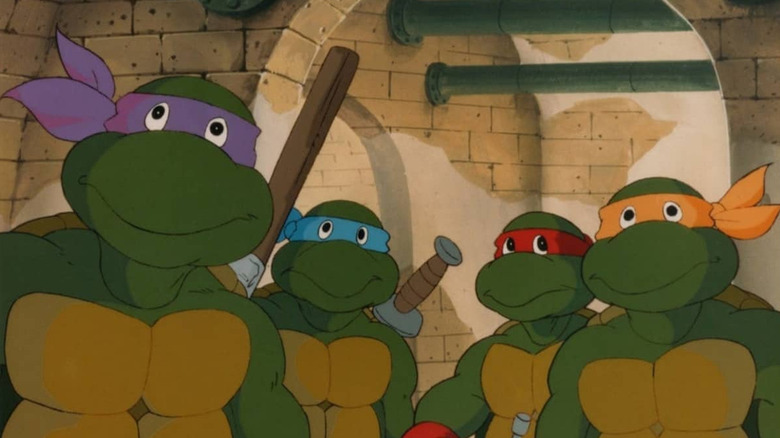 The Turtles standing together in Teenage Mutant Ninja Turtles