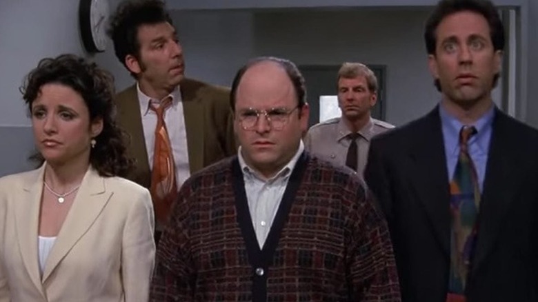 Elaine, Kramer, George, and Jerry being led into court on "Seinfeld."