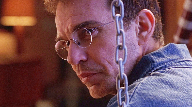 Billy Bob Thornton as Terry sitting on a swing in Bandits