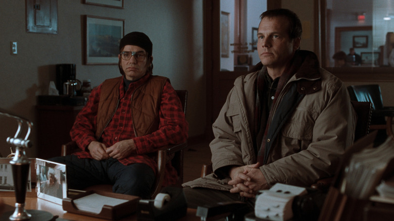 Bill Paxton's Hank Mitchell and Billy Bob Thornton's Jacob Mitchell sitting together in A Simple Plan