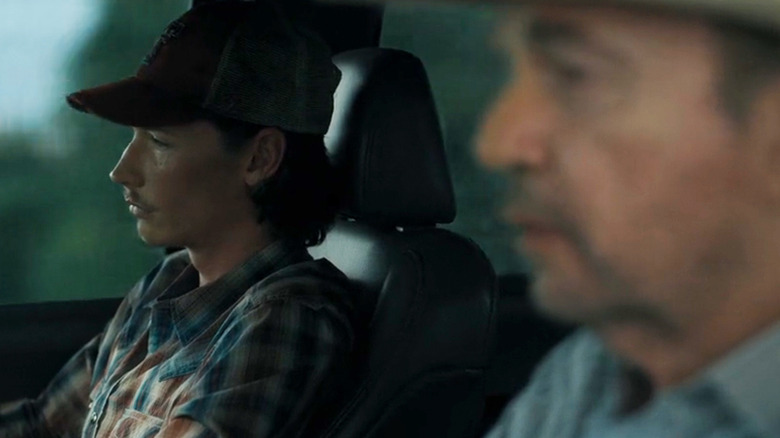 Jacob Lofland's Cooper Norris sits alongside Billy Bob Thornton's Tommy Norris in a car in Landman