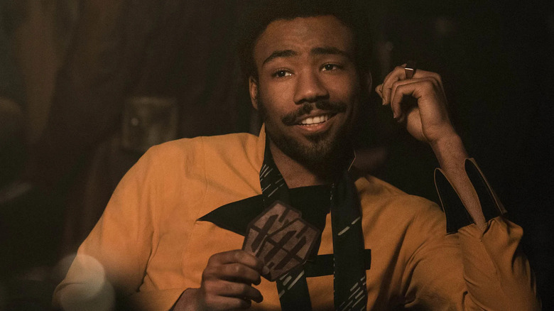 Donald Glover playing cards Solo: A Star Wars Story