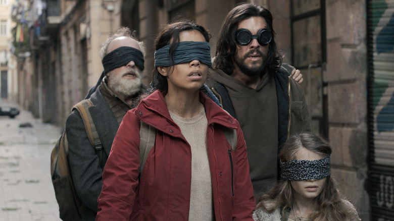 Blindfolded people in the street in Bird Box Barcelona