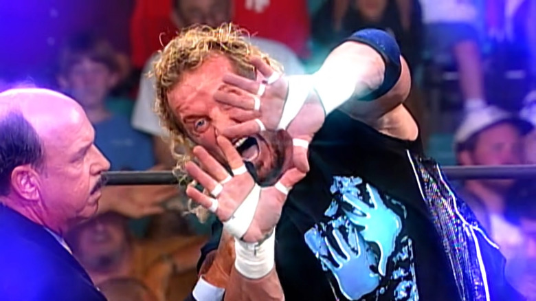 Diamond Dallas Page talking to Mean Gene Okerlund in WCW
