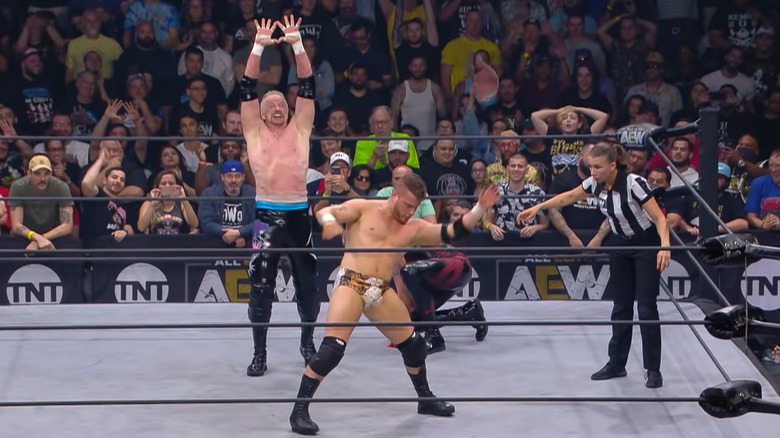 Diamond Dallas Page preparing to give MJF a Diamond Cutter