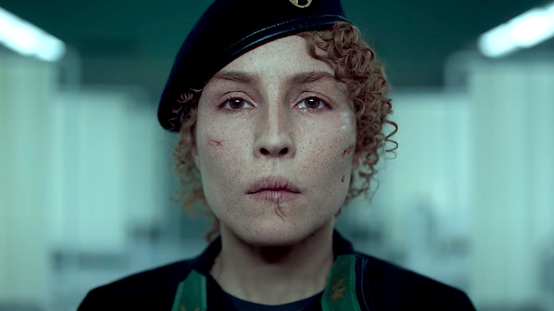 Caroline Edh in uniform stares down the camera