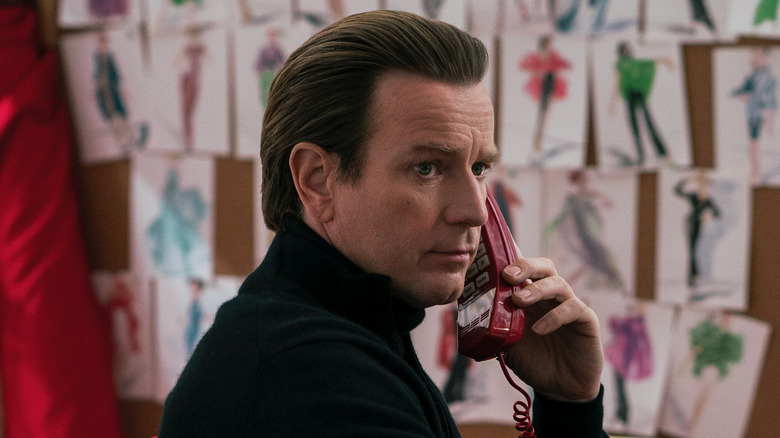Ewan McGregor as Halston, taking a phone call on Halston