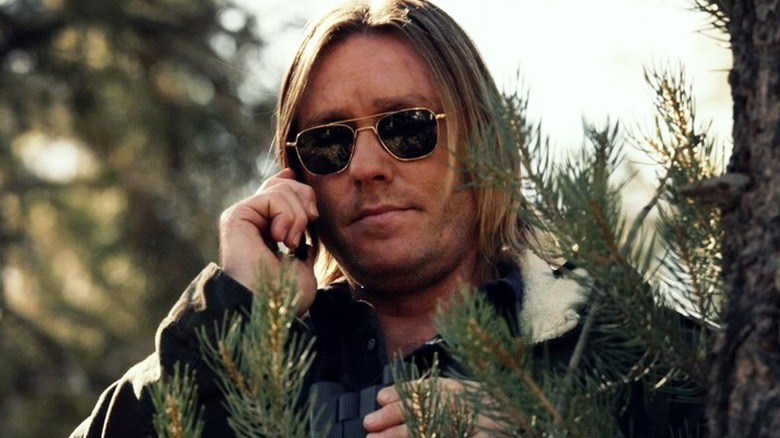 Ron Eldard as Colton Rhodes, spying on someone on Justified