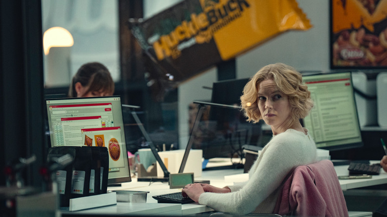Verity sits at her desk in Black Mirror season 7