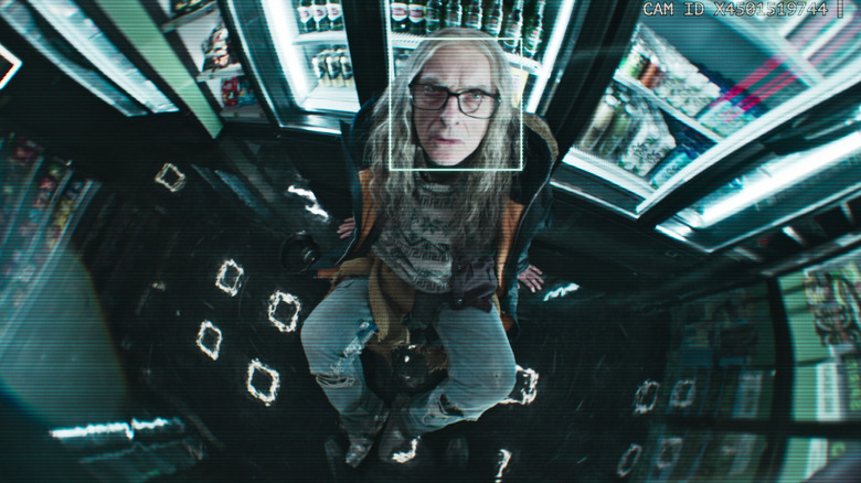 Cameron Walker looks into a security camera in Black Mirror season 7