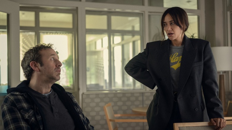 Mike and Amanda arguing in the Rivermind office on Black Mirror