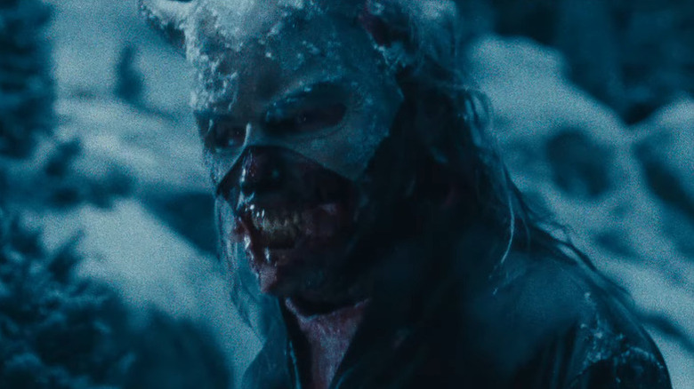 The Grabber unveils his true form as the lower part of his mask is off, showing his disfigured flesh in The Black Phone 2