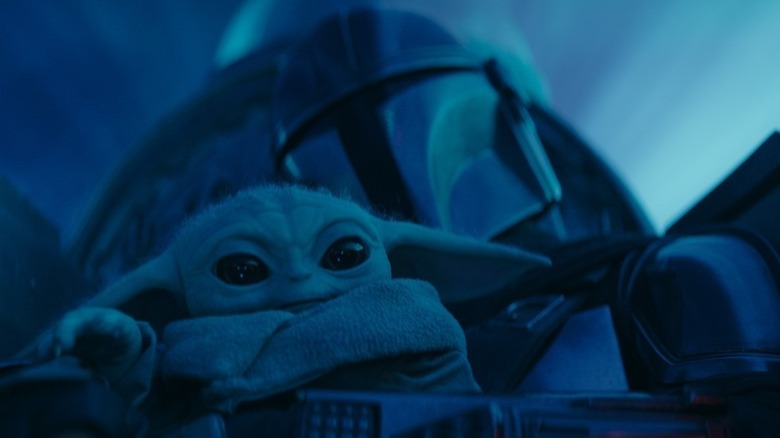 Grogu and Din in The Mandalorian