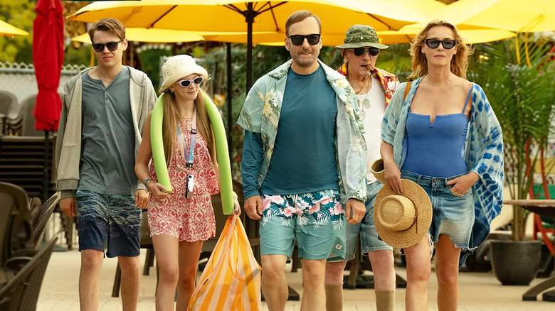 The Mansil family wears vacation clothes in no one 2