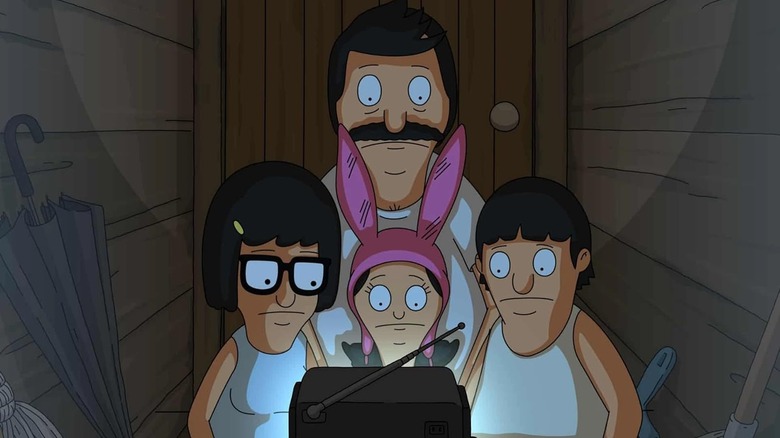 Bob and his children watching TV in a closet in Bob's Burgers
