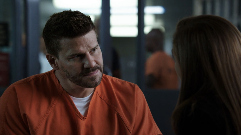 David Boreanaz's Agent Seeley Booth talks to Emily Deschanel's Temperance Brennan in prison in Bones