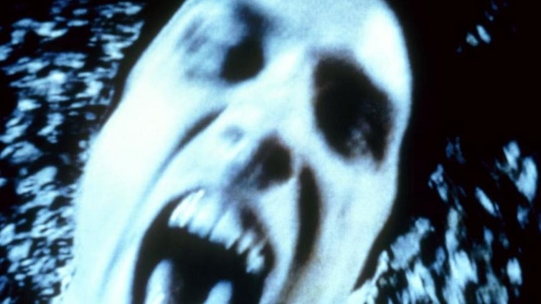 Jeff's face blurred in front of the camera in Book of Shadows: Blair Witch 2