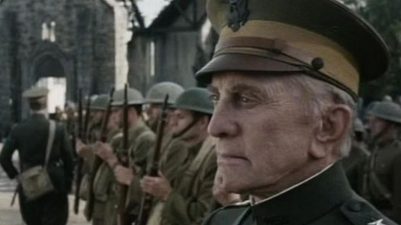 General Calthrob standing in line with other soldiers in Tales from the Crypt