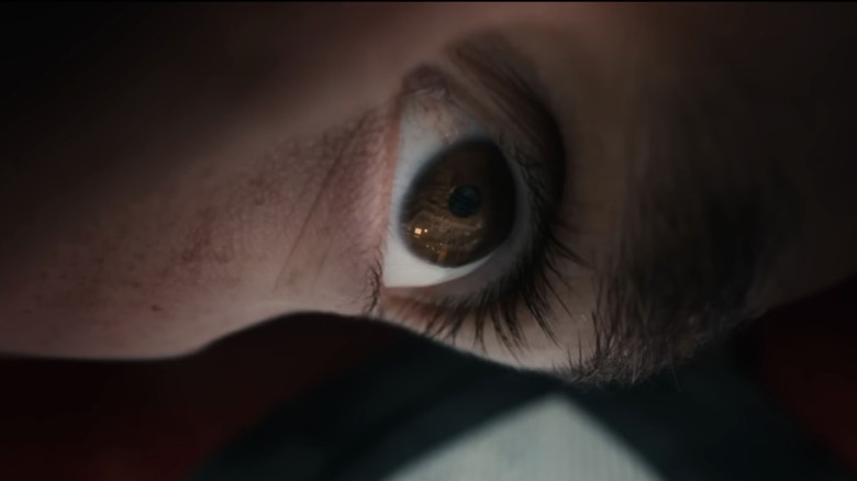 The eye of Tom Holland's Spider-Man is seen in extreme closeup in Spider-Man: Brand New Day.png