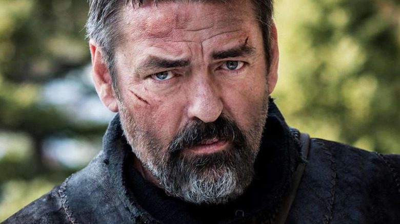 Robert staring in despair in Robert the Bruce