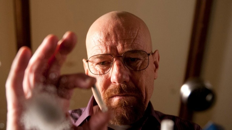 Walt holding a bullet in his right hand in Breaking Bad