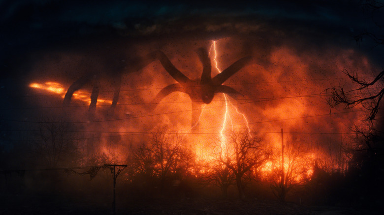A vision of the Mind Flayer looming over Hawkins in Stranger Things