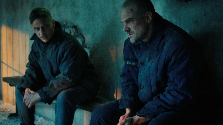 David Harbour as Jim Hopper sitting in a cell in Stranger Things