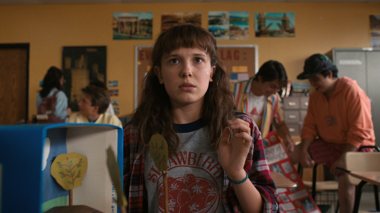 Eleven sitting in a classroom in California in Stranger Things