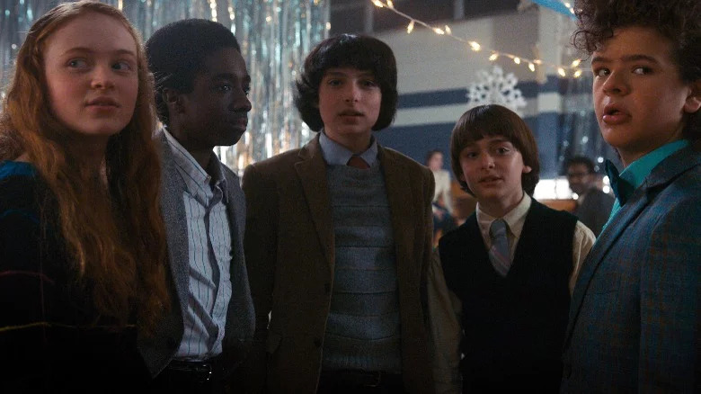 Mike, Lucas, Max, Dustin, and Will at the Winter Formal Dance in Stranger Things