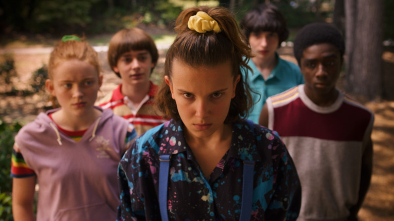 Eleven leading the gang in Stranger Things